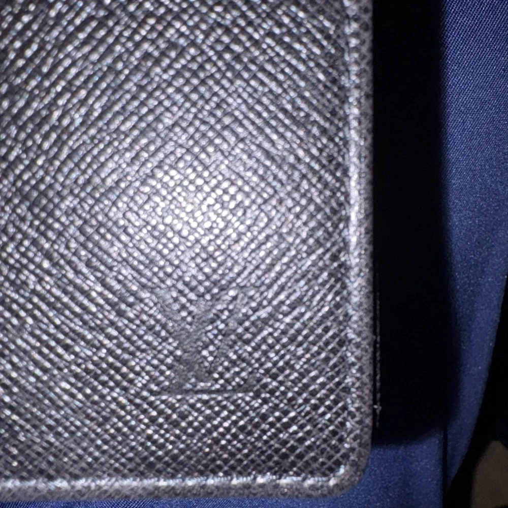 Vintage black Louis Vuitton passport holders‎